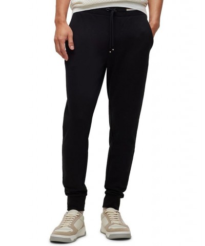 BOSS Men's Cotton Tracksuit Bottoms with Signature-Stripe Waistband Black $88.36 Pants