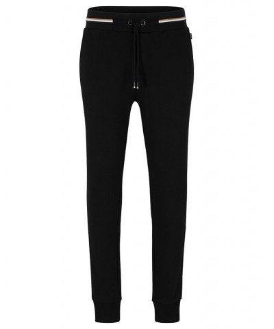 BOSS Men's Cotton Tracksuit Bottoms with Signature-Stripe Waistband Black $88.36 Pants